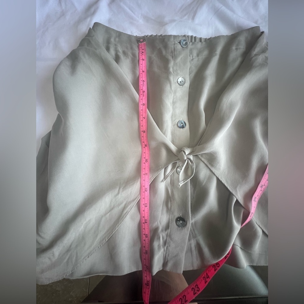 Adam Beige Button-Front Mini Skirt
Caja 7 - Picture 5 of 5